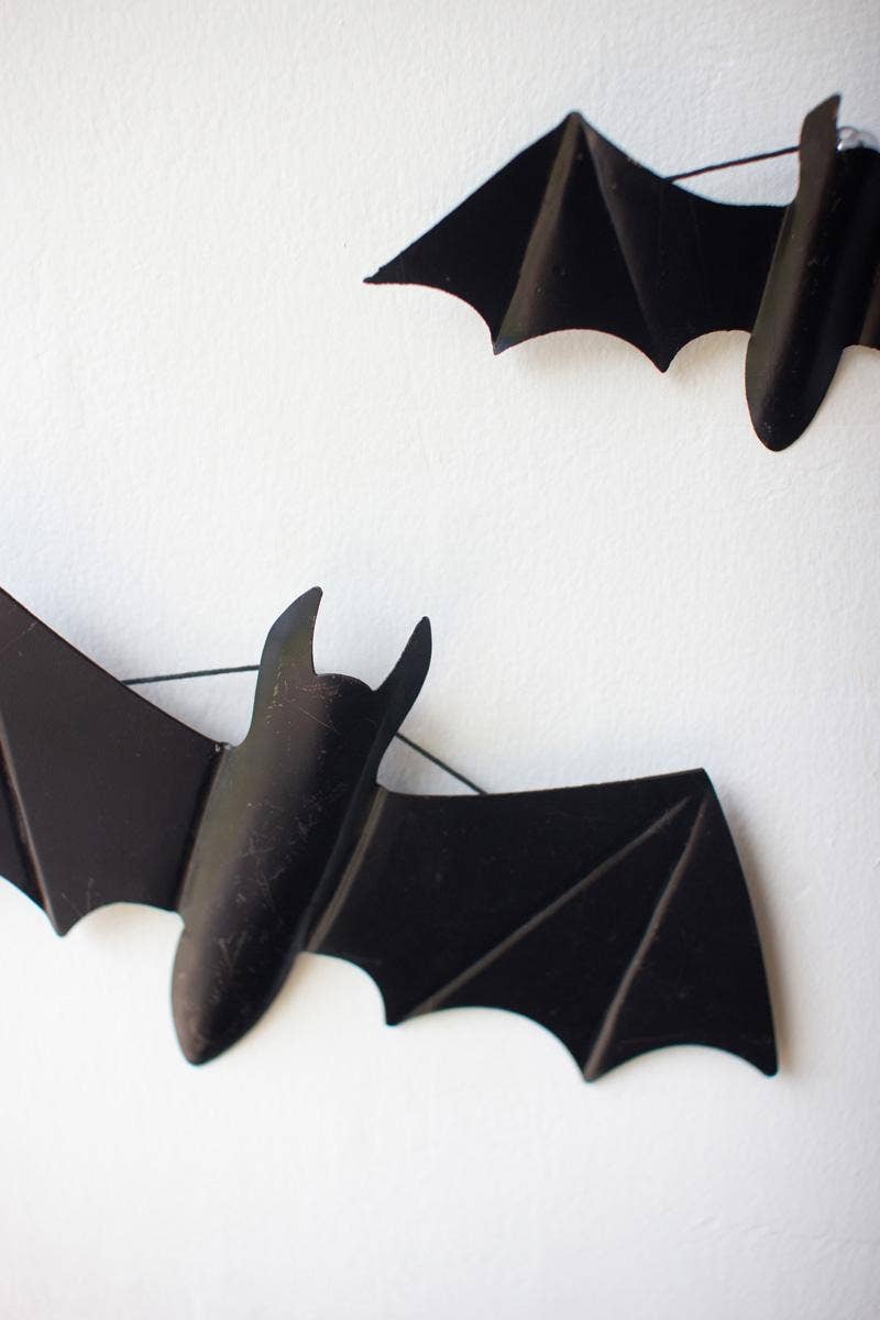SET OF FIVE BLACK METAL BATS - ONE EACH SIZE