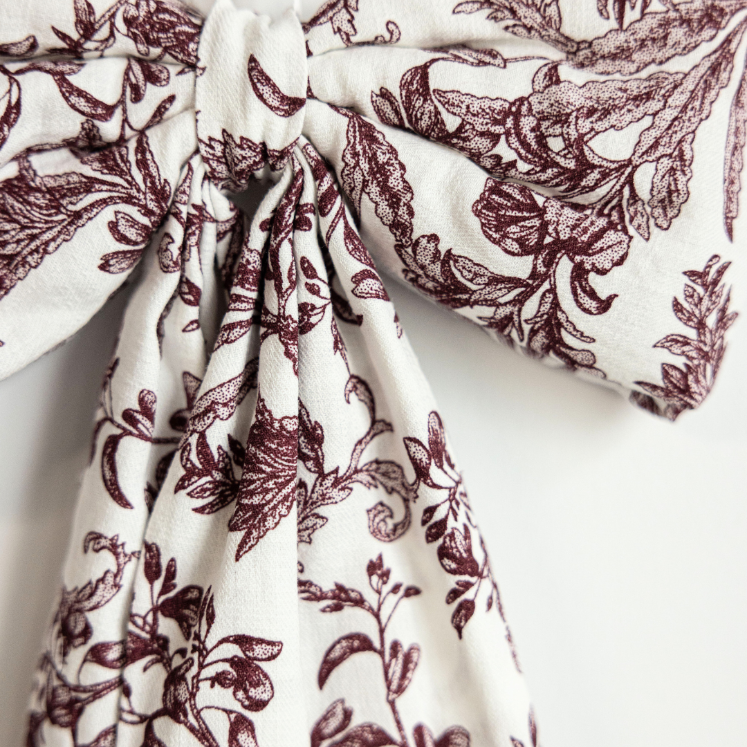 Bows Star Toile Burgundy Fabric